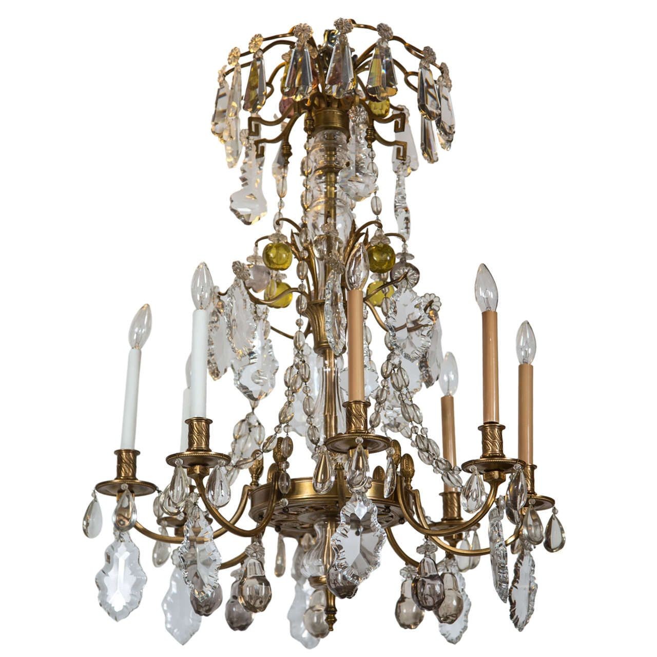 A Finely Cast Bronze and Crystal Eight Arm Chandelier