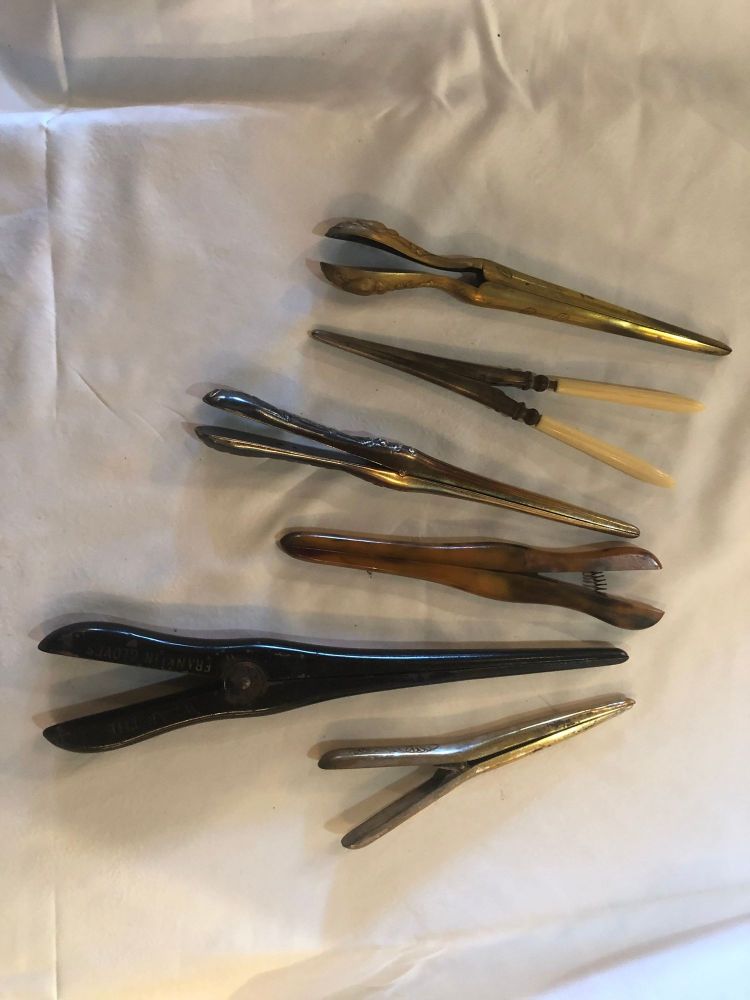 Six Assorted Metal and One Bakelite Antique Glove Stretchers Some Engraved