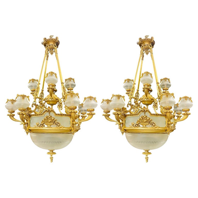 Pair of Louis XVI Style Bronze Chandeliers