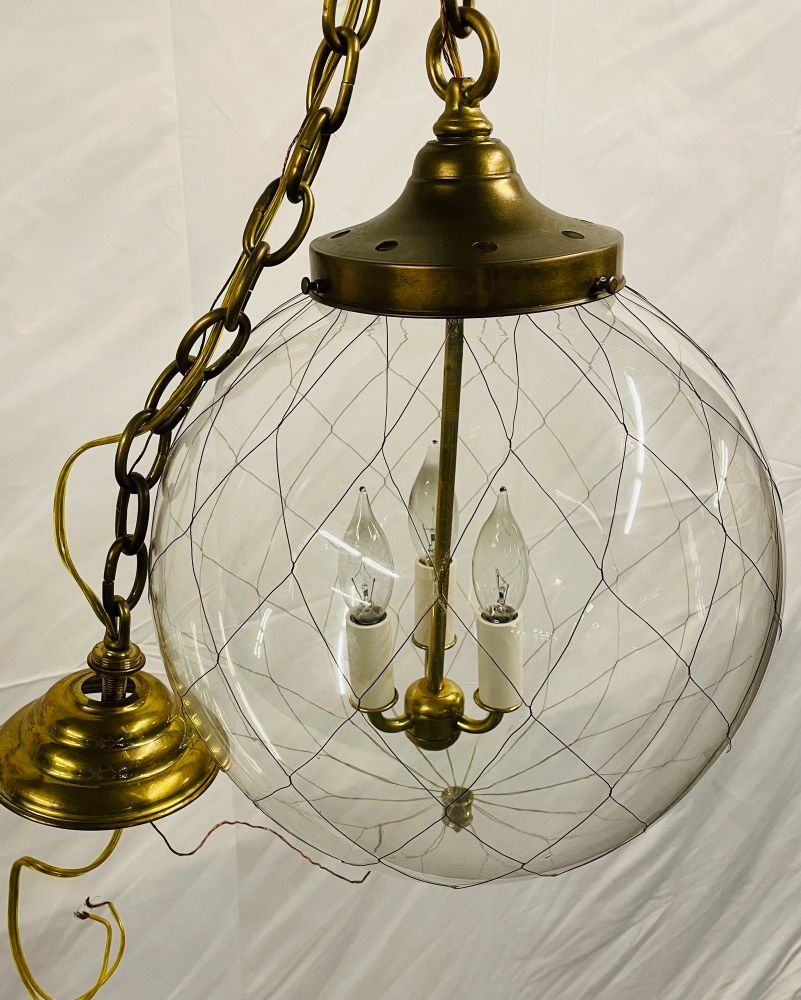 A Pair of Mid Century Modern Globe Pendants, Brass and Hand Blown Glass