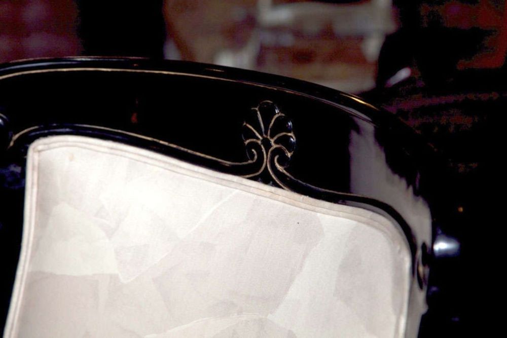 Pair of Hollywood Regency Style Ebonized Armchairs