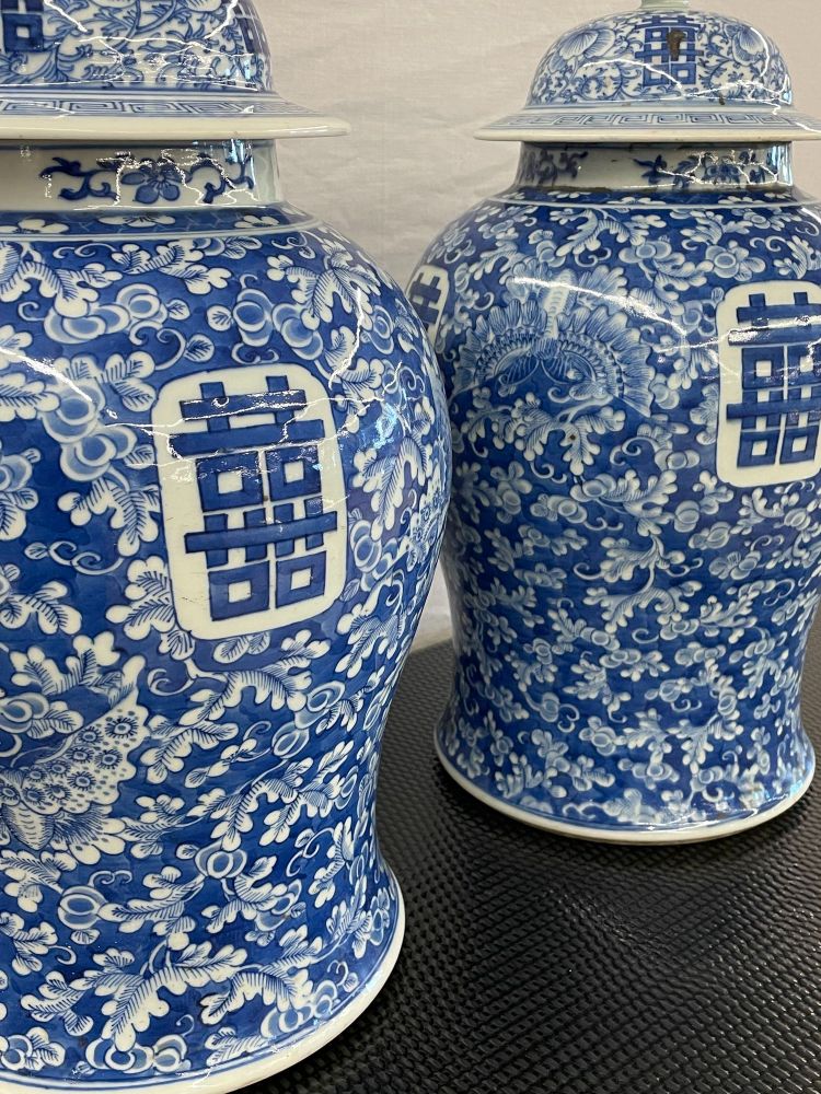 Pair of 19th Century Blue and White Lidded Temple Jars/Urns