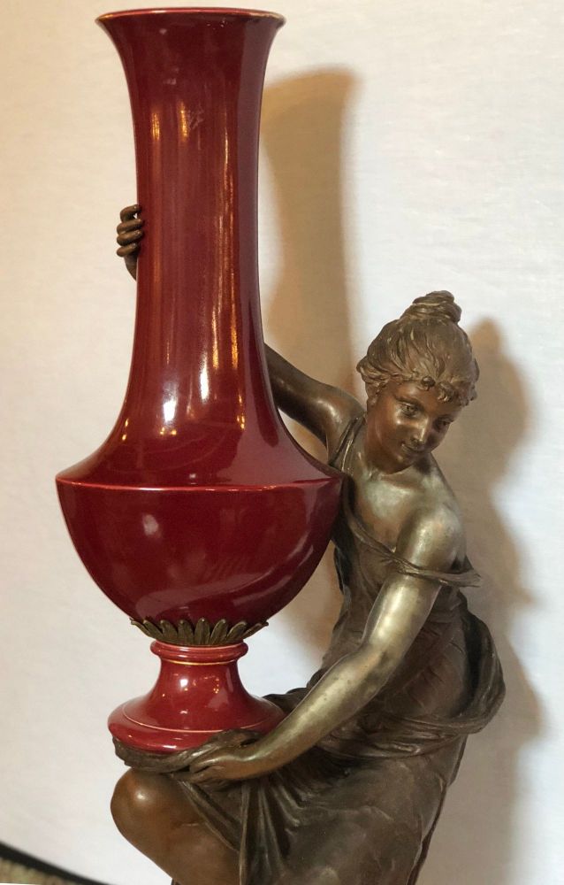 Spelter Figure of a Water Bearer on a Pedestal / Marble with Red Glazed Vase