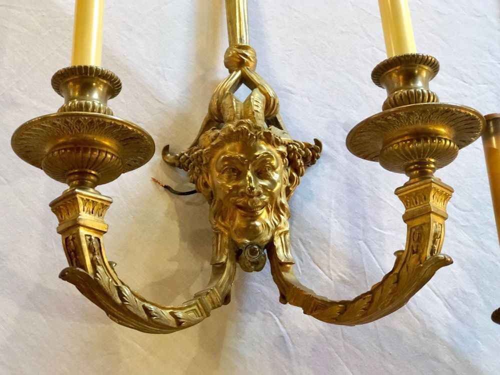 Pair of Dore Bronze Sconces having Horned Bacchus Masks in Louis XVI Style
