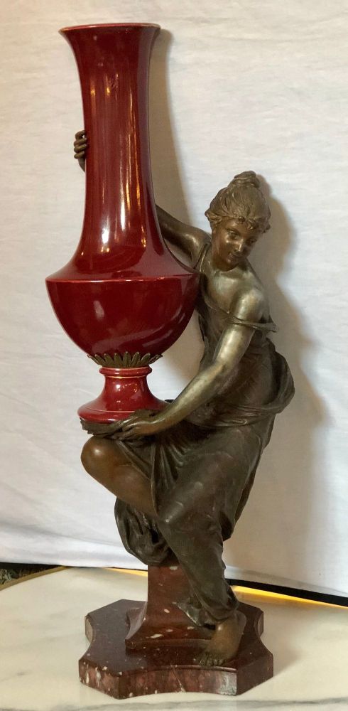 Spelter Figure of a Water Bearer on a Pedestal / Marble with Red Glazed Vase