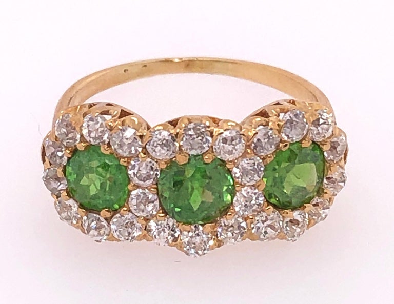 Three-Stone Emerald and Diamond Modern Ring