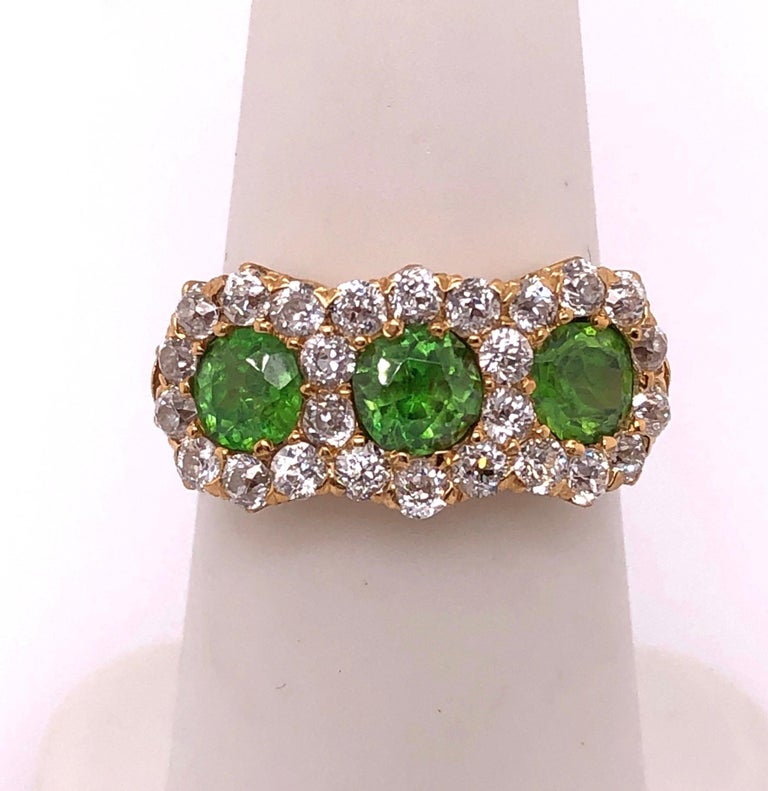Three-Stone Emerald and Diamond Modern Ring