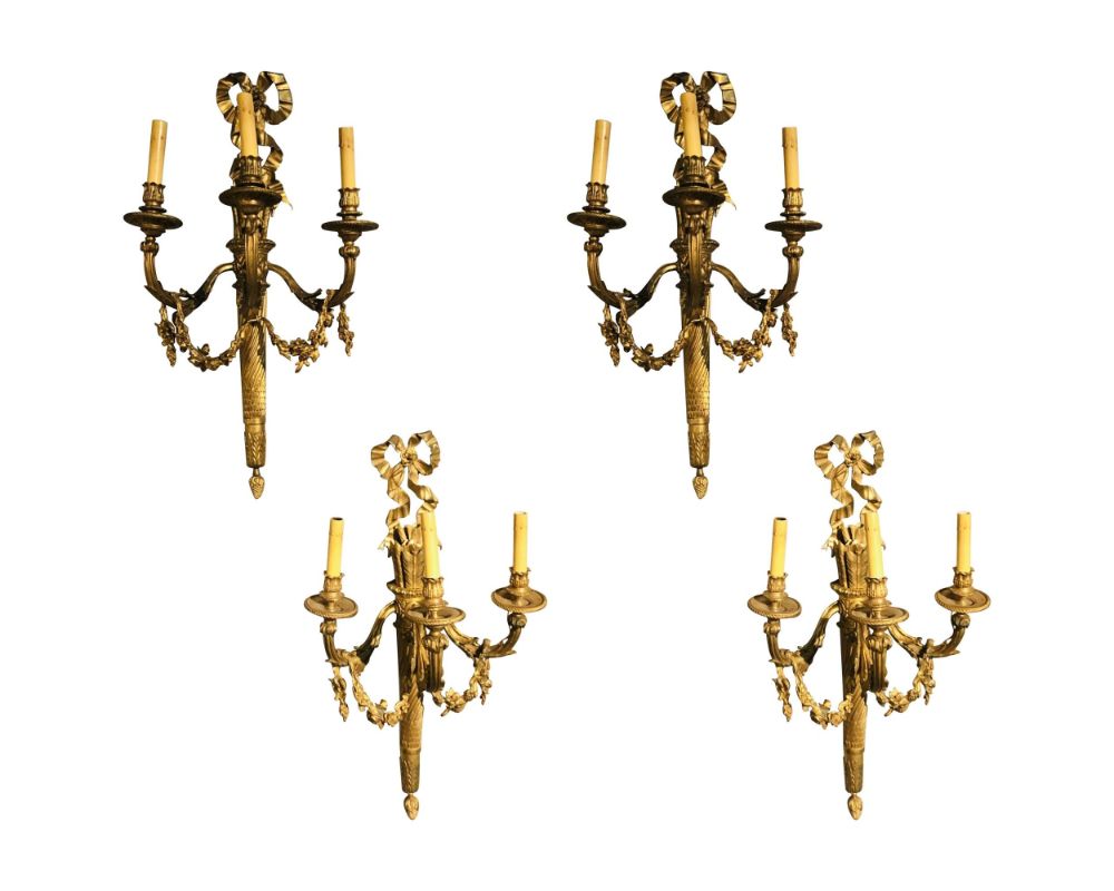 Set of Four Large Ornate Three-Light Torch and Ribbon Form Wall Sconces