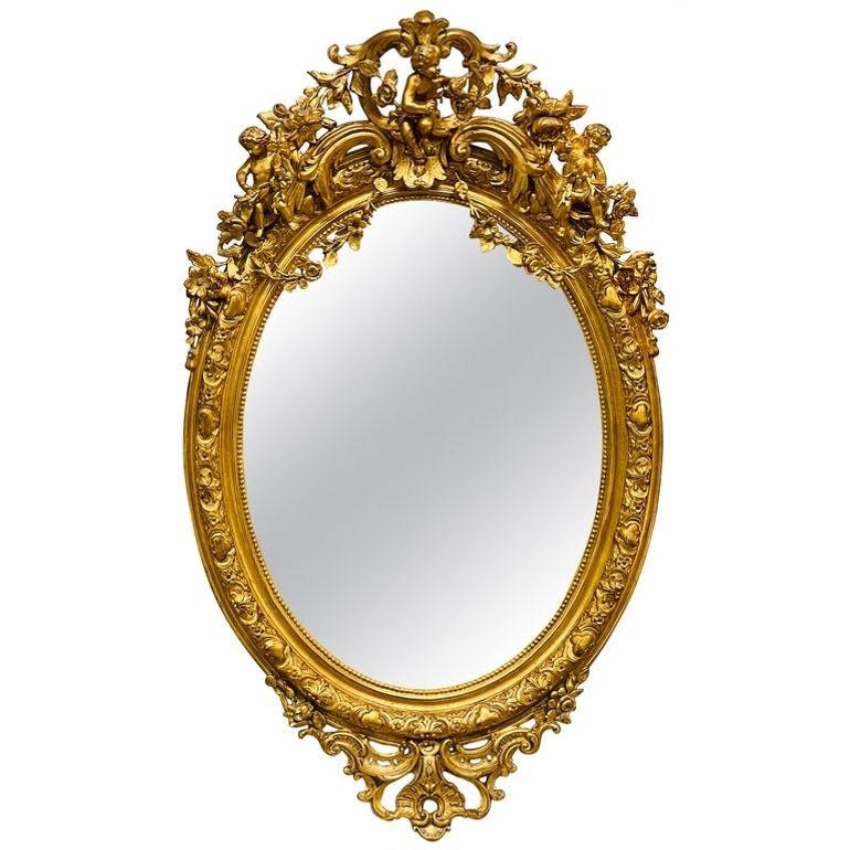 19th Century Palatial Giltwood Wall or Console Mirror Adorning Three Cherubs