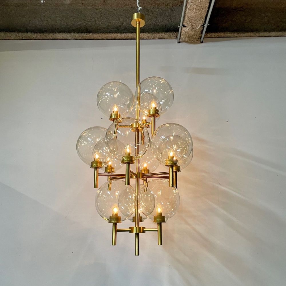 Pair of Monumental Mid-Century Modern Style Chandeliers in Amber Glass and Brass