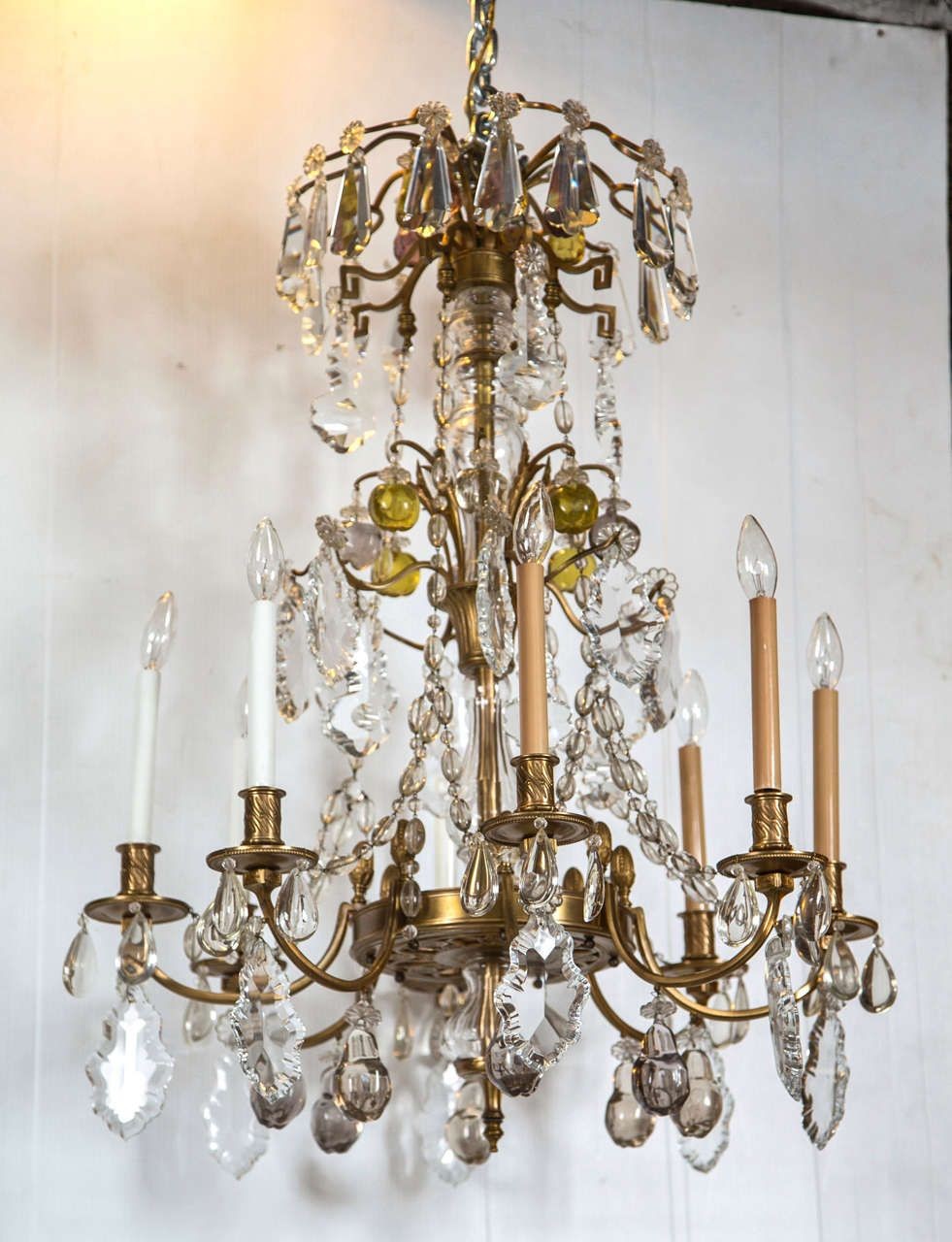 A Finely Cast Bronze and Crystal Eight Arm Chandelier