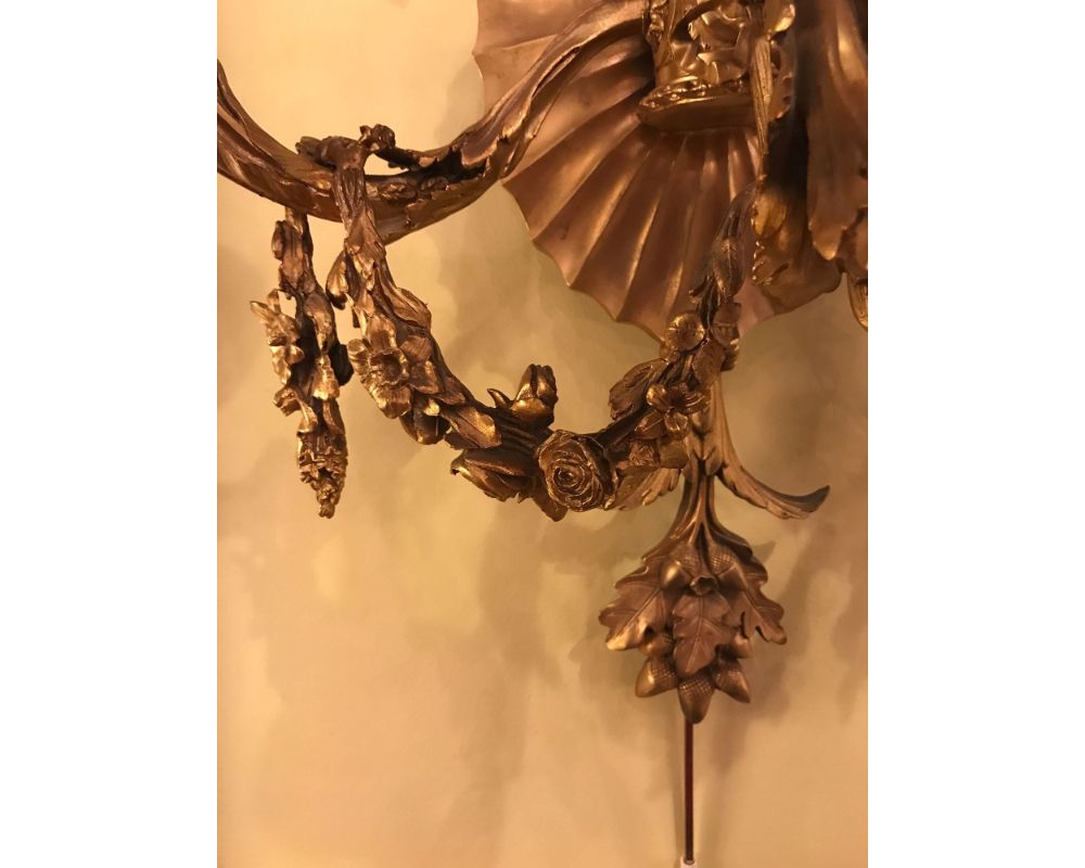 Pair of Bronze Three-Light Sconces in an Urn Form