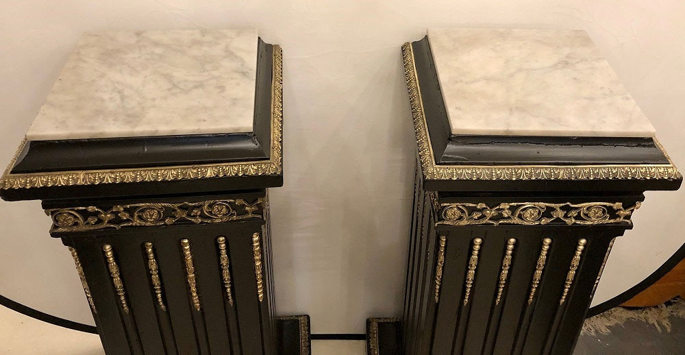 Hollywood Regency Neoclassical Ebony Pedestals, Bronze Mounted Marble Tops, Pair