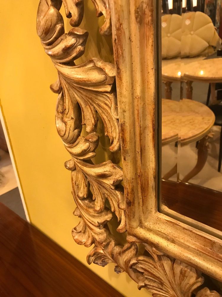 Heavily Carved French Frame Flanking a Bevelled Glass Wall or Console Mirror