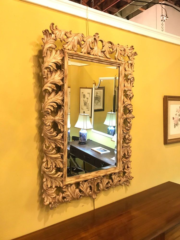 Heavily Carved French Frame Flanking a Bevelled Glass Wall or Console Mirror
