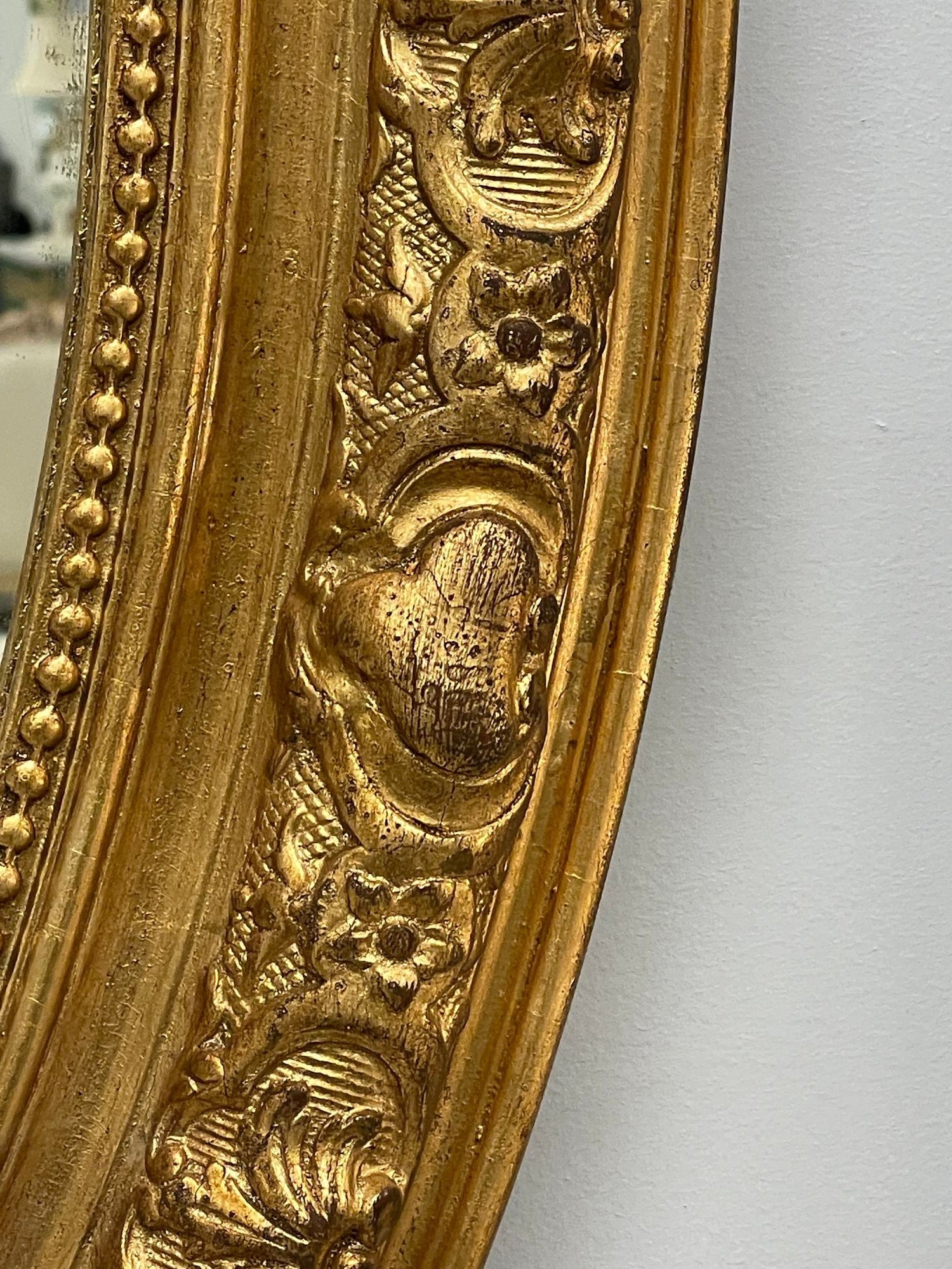 19th Century Palatial Giltwood Wall or Console Mirror Adorning Three Cherubs